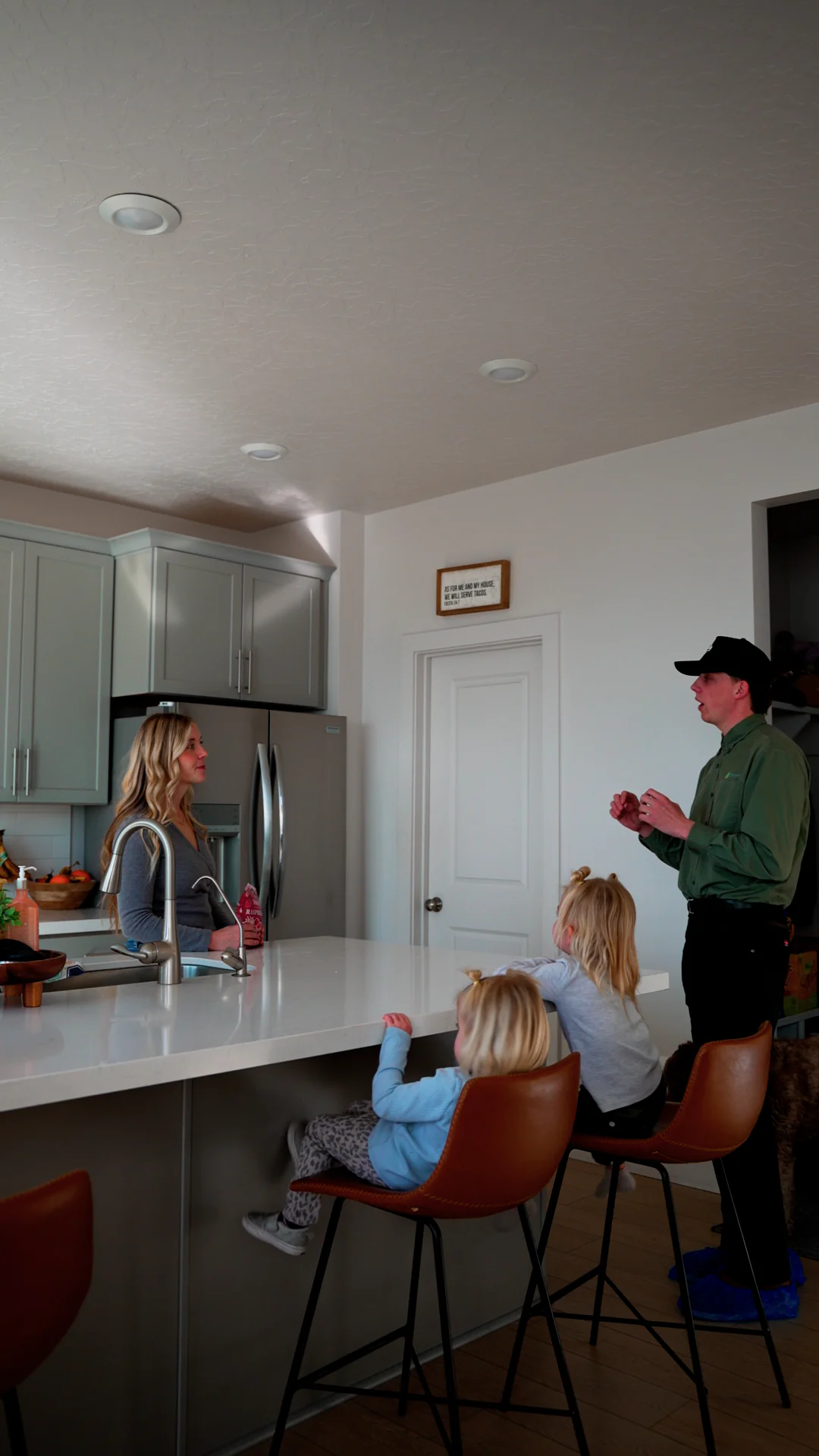 Natures Balance Pest Control Service Specialist speaking with utah homeowner about pest issue inside home